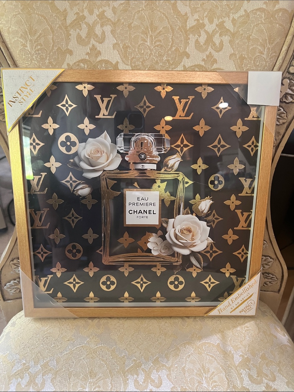 CHANEL Black and Gold Eau Première Framed Wall Art with White Floral Accents